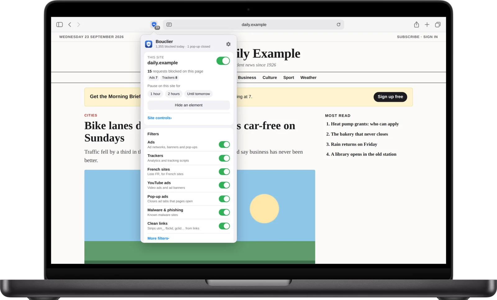 Bouclier's menu open in Safari on a MacBook Pro, on a news site: 15 requests blocked on this page, and Pause on this site for 1 hour, 2 hours or until tomorrow.